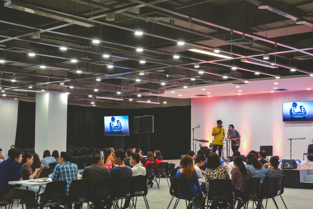 What’s the Real ROI of Bringing in a Professional Speaker for Your Conference?